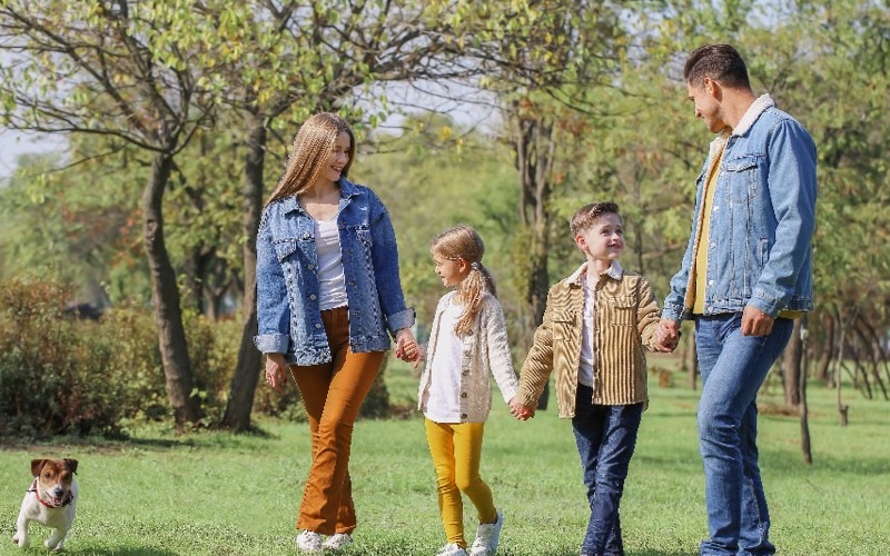 A family walking together through a park